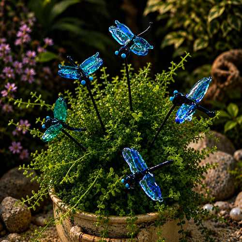 Five blue glass dragonfly garden stakes planted in a green succulent arrangement in a pot, with a 'Plant Sticks dragonfly Bundle' logo overlay in the top left.